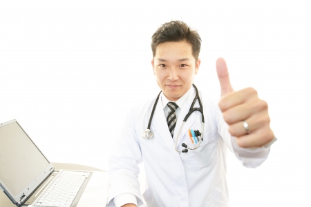 Smiling Asian medical doctor の写真素材
