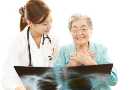 Asian medical doctor and senior womanの写真素材