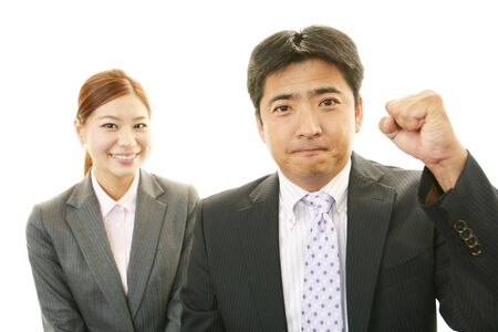 Smiling businessman and businesswomenの写真素材