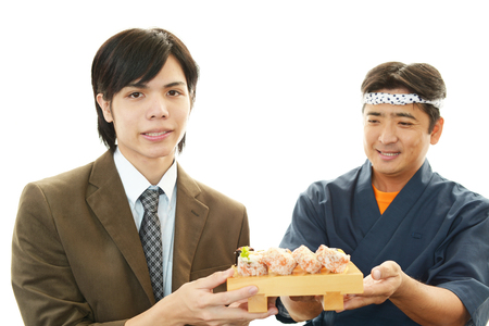 Sushi chef and customerの写真素材