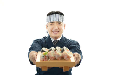 Portrait of a sushi chefの写真素材