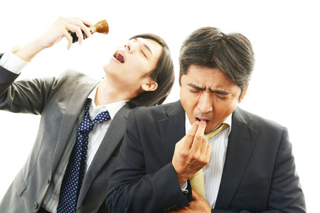 Men drinking sakeの写真素材