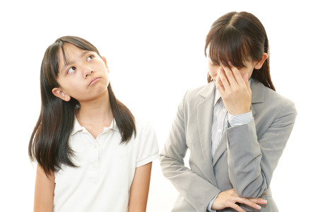 Teacher with girl studying  の写真素材