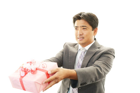 Smiling businessman with presentの写真素材