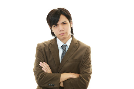Frustrated Businessman isolated on white の写真素材