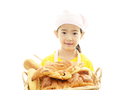 Girl with breadの写真素材
