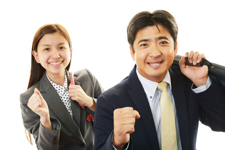 Smiling businessman and businesswomenの写真素材