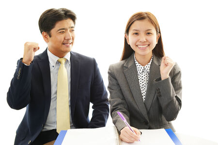 Smiling businessman and businesswomenの写真素材
