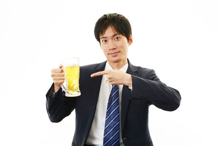 Man drinking beerの写真素材
