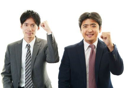 Smiling Asian businessmenの写真素材