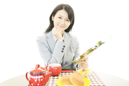 Woman eating mealsの写真素材