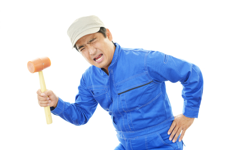 Portrait of tired worker の写真素材