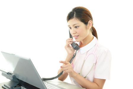 Smiling Asian female nurseの写真素材