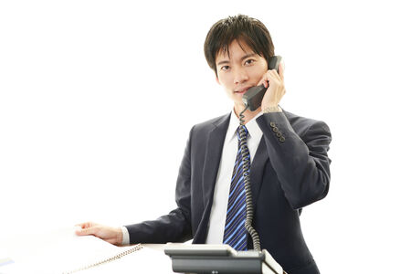 Smiling Asian businessmanの写真素材