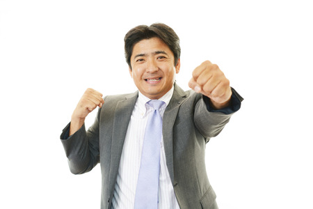 Smiling Asian businessmanの写真素材