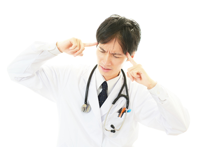 Doctor thinking の写真素材
