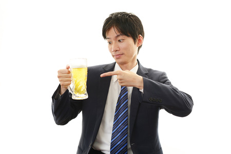 Man drinking beerの写真素材