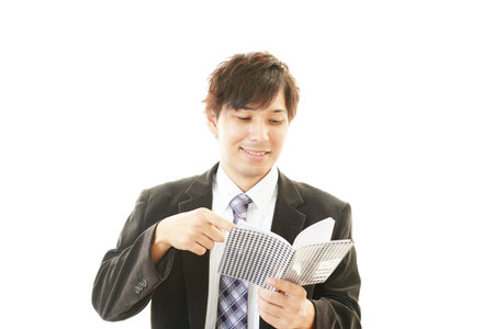 Smiling Asian businessmanの写真素材