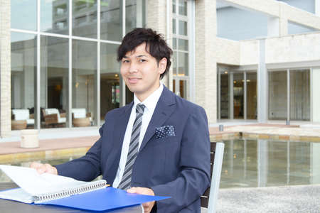 Smiling Asian businessmanの写真素材
