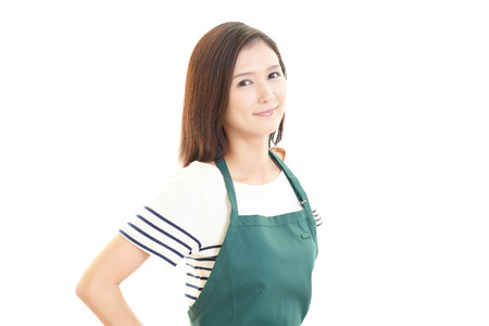 Smiling Asian housewifeの写真素材