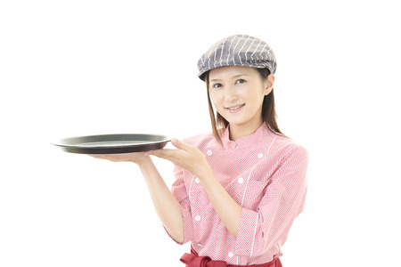 Smiling young waitressの写真素材