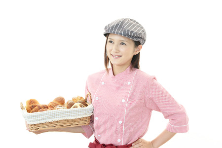 Smiling young bakerの写真素材