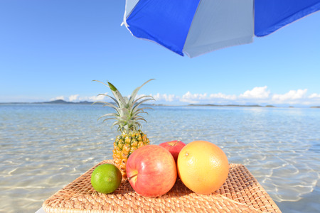 Tropical fruit on the beachの写真素材