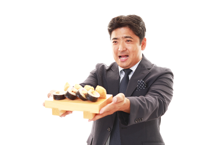 The man who eats sushiの写真素材