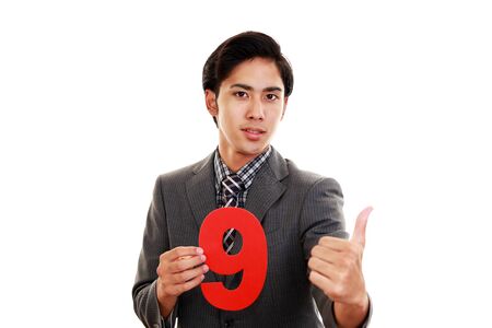 Man with a numberの写真素材