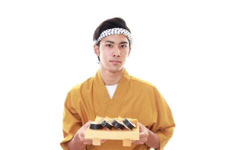 Portrait of a sushi chefの写真素材