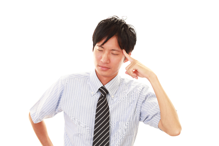 Disappointed Asian businessmanの写真素材