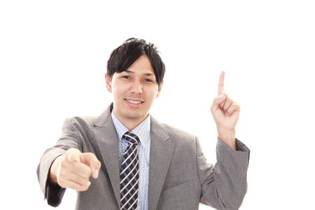 Smiling Asian businessmanの写真素材