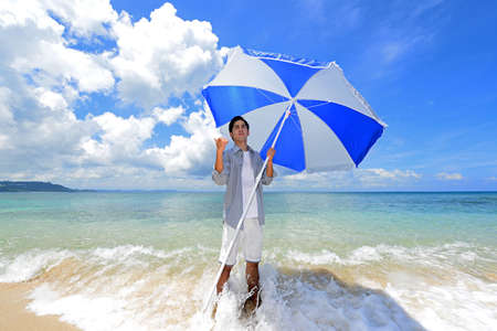 The man who relaxes on the beach.の写真素材