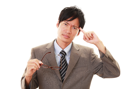 Frustrated Asian businessmanの写真素材