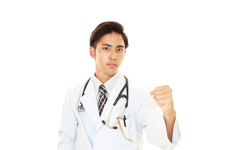 Smiling Asian medical doctorの写真素材