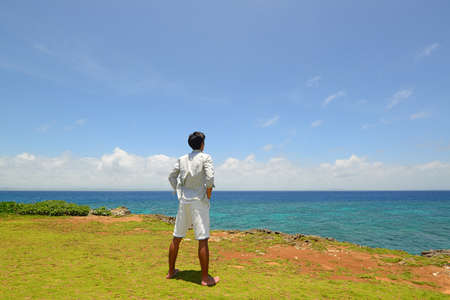 The man who relaxes on the beach.の写真素材
