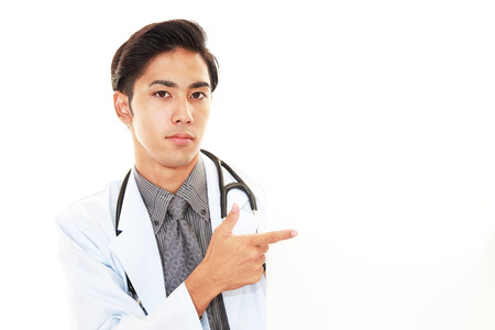 Smiling Asian medical doctorの写真素材
