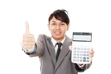 Asian business man showing thumbs up signの写真素材