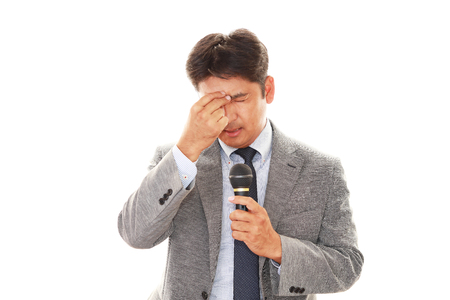 Tired Asian businessmanの写真素材