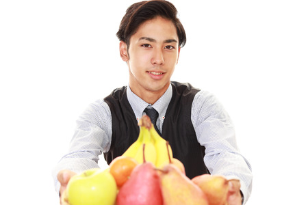 Smiling Asian waiterの写真素材