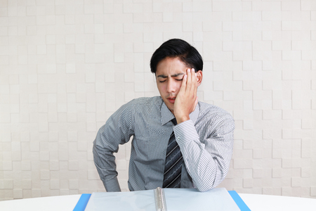 Disappointed Asian businessmanの写真素材
