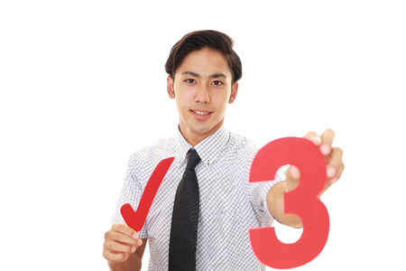 Man with a numberの写真素材