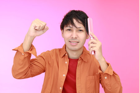 A man taking care of his hair