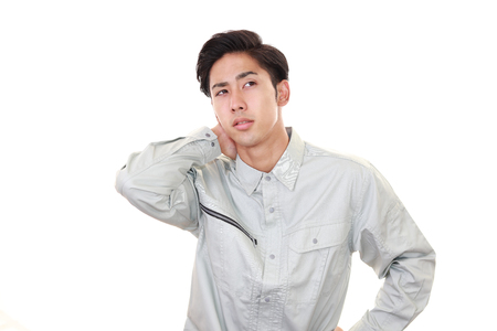 Worker with shoulder painの写真素材