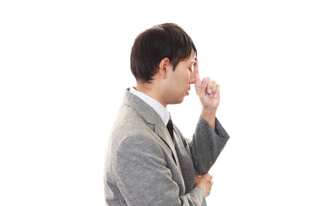 Portrait of a business man looking depressedの写真素材