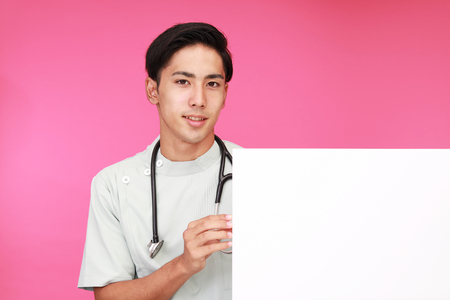 Smiling Asian medical doctorの写真素材