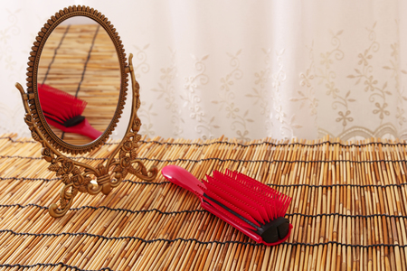 Vintage hand mirror and comb.の写真素材