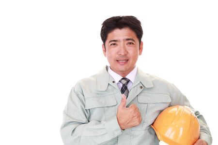 Smiling Asian workerの写真素材