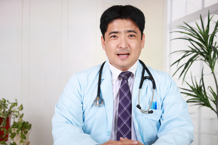 Smiling Asian medical doctorの写真素材