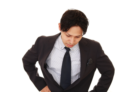 Disappointed Asian businessmanの写真素材
